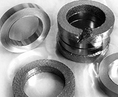 Die formed graphite rings